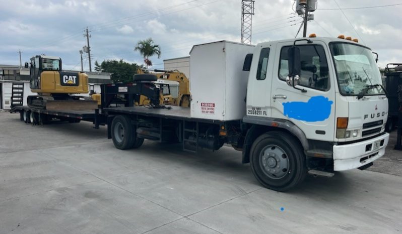 2007 Mitsubishi FM 330 with, 2022 Hooper Equipment Trailer, 22.5 Ton, Gooseneck and 2006 PJ Dump Hurricane Clean Up Trailer, 10 Ton, Gooseneck. full