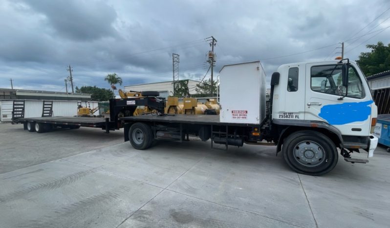 2007 Mitsubishi FM 330 with, 2022 Hooper Equipment Trailer, 22.5 Ton, Gooseneck and 2006 PJ Dump Hurricane Clean Up Trailer, 10 Ton, Gooseneck. full